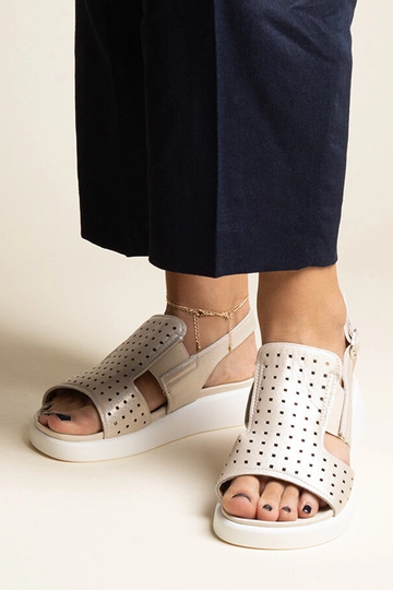 Black sandals on a block...