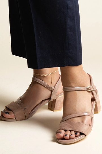 Black sandals on a block...