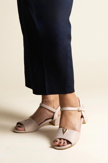 Black sandals on a block...