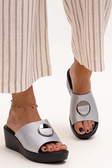 Black sandals on a block... 2