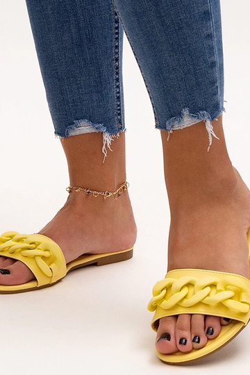 Black sandals on a block...