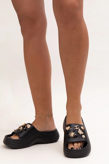 Black sandals on a block... 2