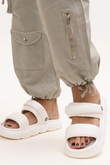 Black sandals on a block...