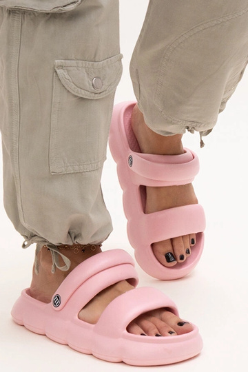 Black sandals on a block... 2