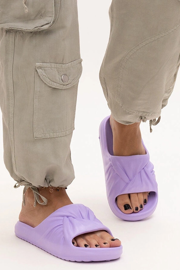 Black sandals on a block... 2