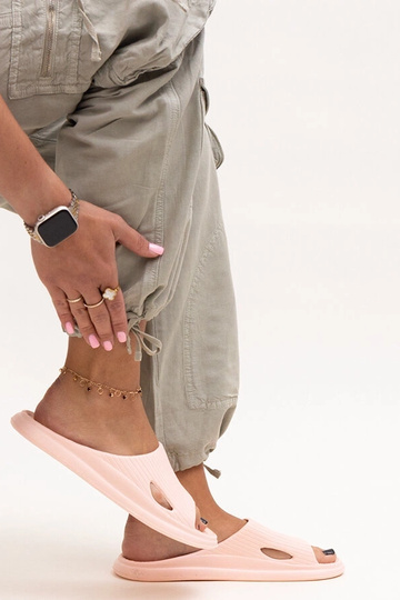 Black sandals on a block...