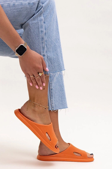 Black sandals on a block...