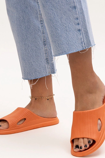 Black sandals on a block... 2