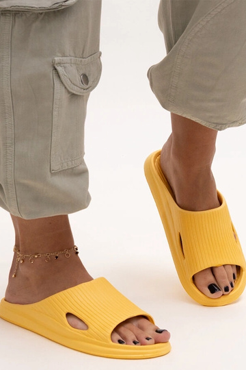 Black sandals on a block...