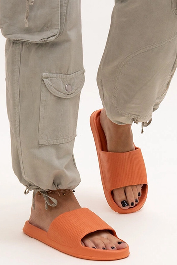 Black sandals on a block...