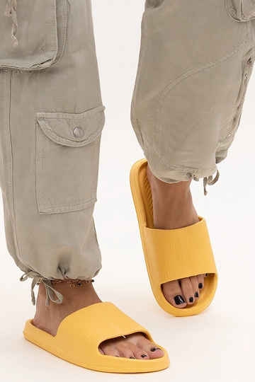 Black sandals on a block...