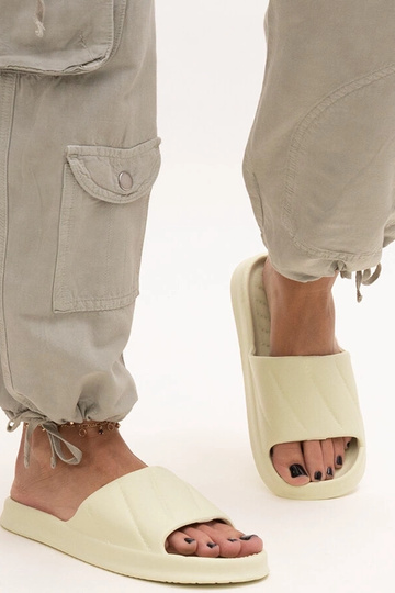 Black sandals on a block... 2