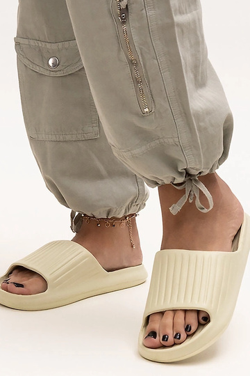 Black sandals on a block...