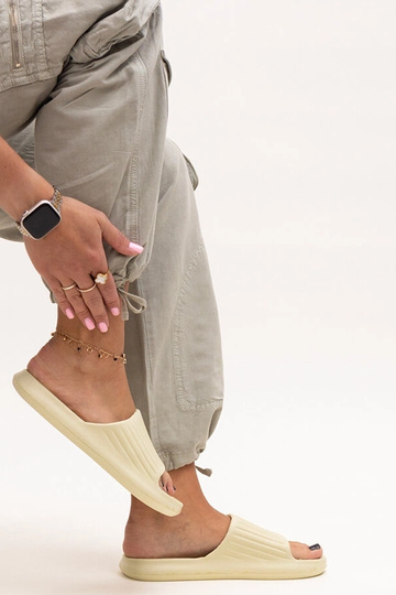 Black sandals on a block... 2