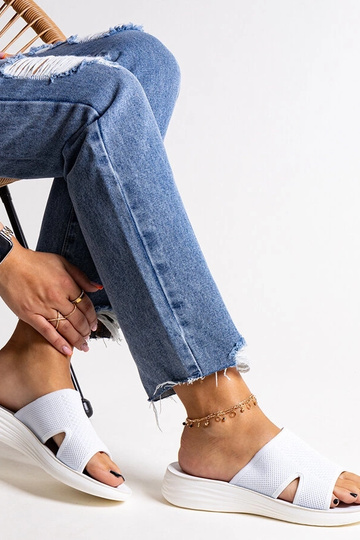 Black sandals on a block... 2