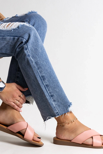 Black sandals on a block...