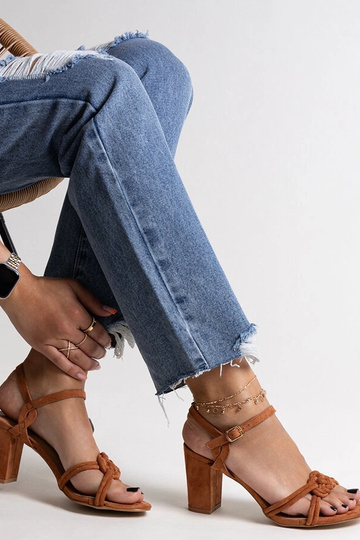 Black sandals on a block... 2