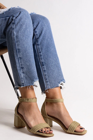 Black sandals on a block... 2