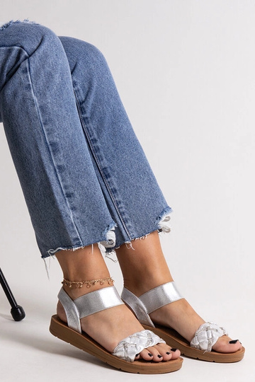 Black sandals on a block... 2