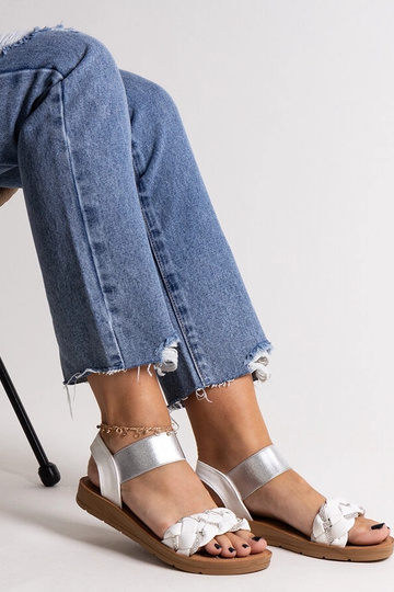 Black sandals on a block...