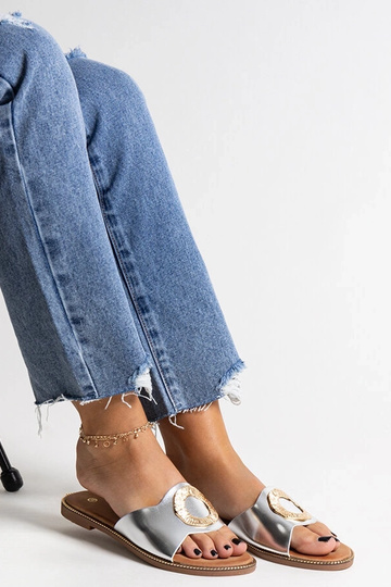 Black sandals on a block...