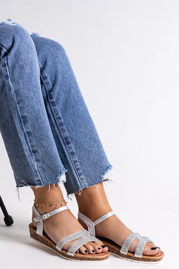 Black sandals on a block...