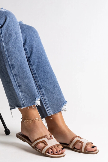 Black sandals on a block... 2