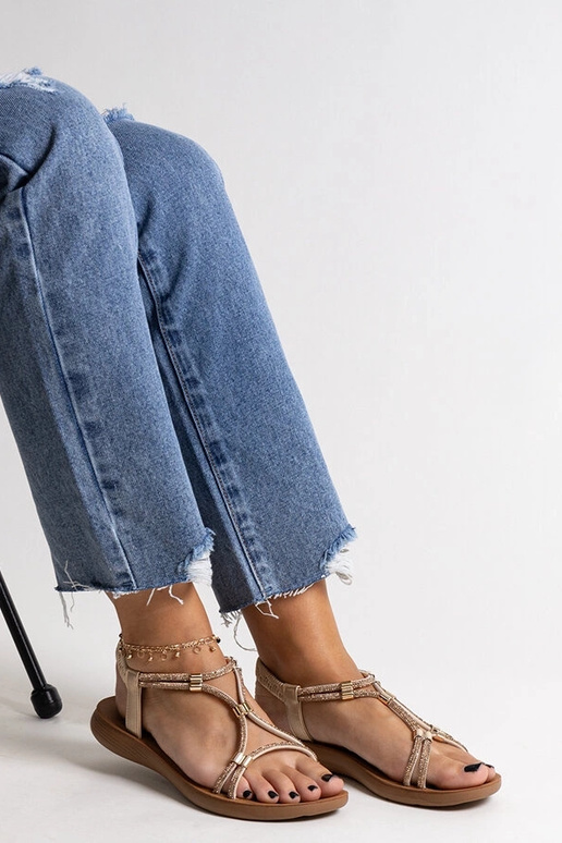 Złote sandałki zdobione cyrkoniami...