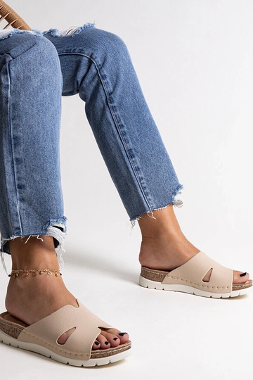 Black sandals on a block...