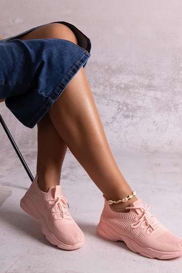 Pink sports sneakers by... 2