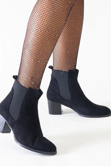 Black cowboy boots on the... 2