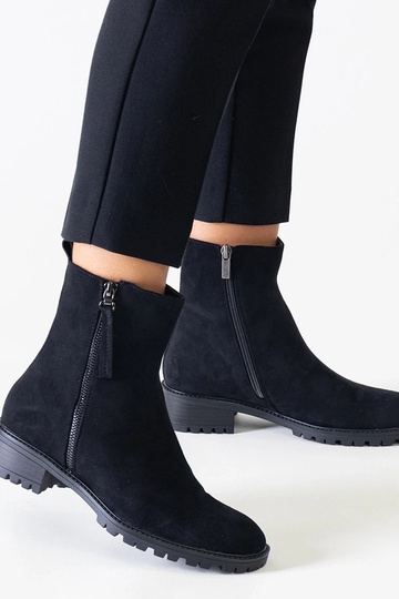 Black cowboy boots on the...