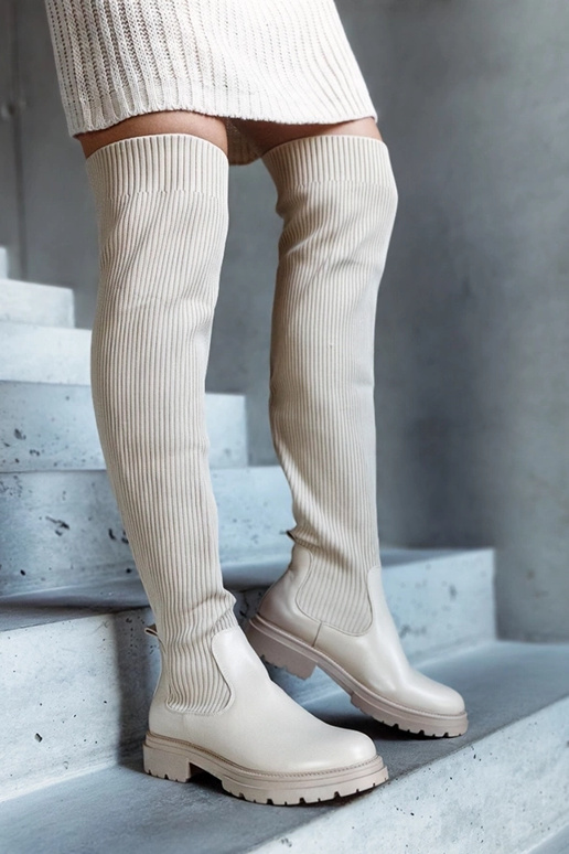 Beżowe długie kozaki z elastyczną... Beżowe długie kozaki z elastyczną...