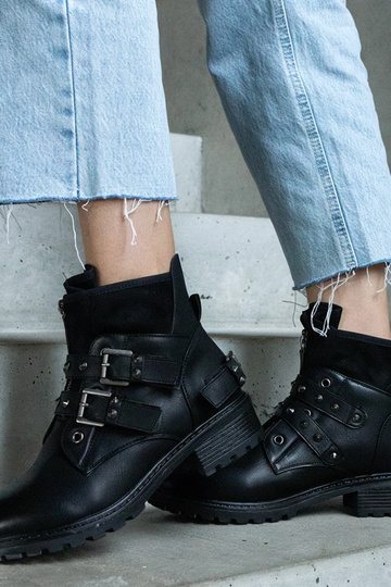 Black cowboy boots on the...