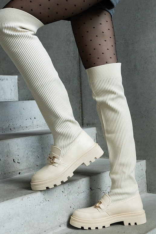 Jasnobeżowe kozaki z elastyczną... Jasnobeżowe kozaki z elastyczną...