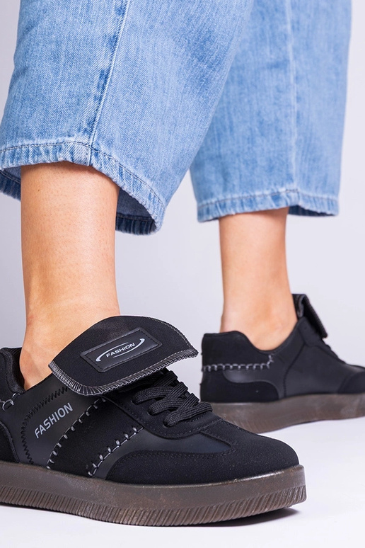 Czarne sneakersy na platformie z... Czarne sneakersy na platformie z...