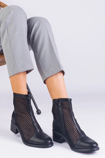 Black cowboy boots on the...