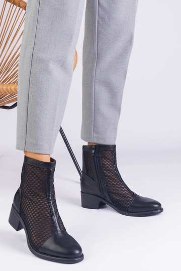 Black cowboy boots on the... 2