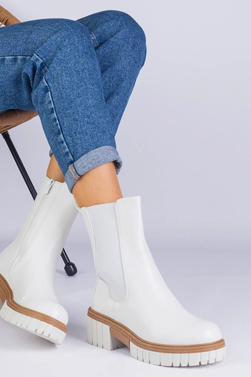 Black cowboy boots on the...