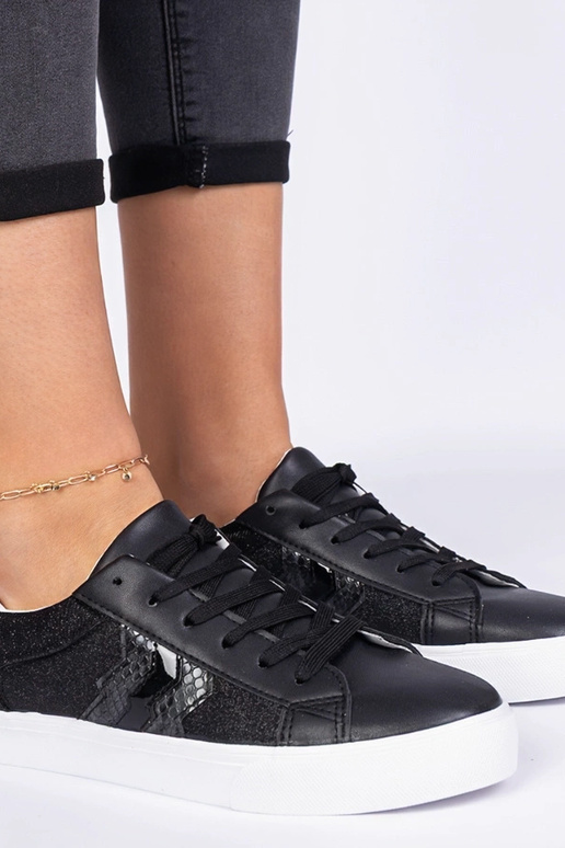 Czarne sneakersy ze zwierzęcym... Czarne sneakersy ze zwierzęcym...