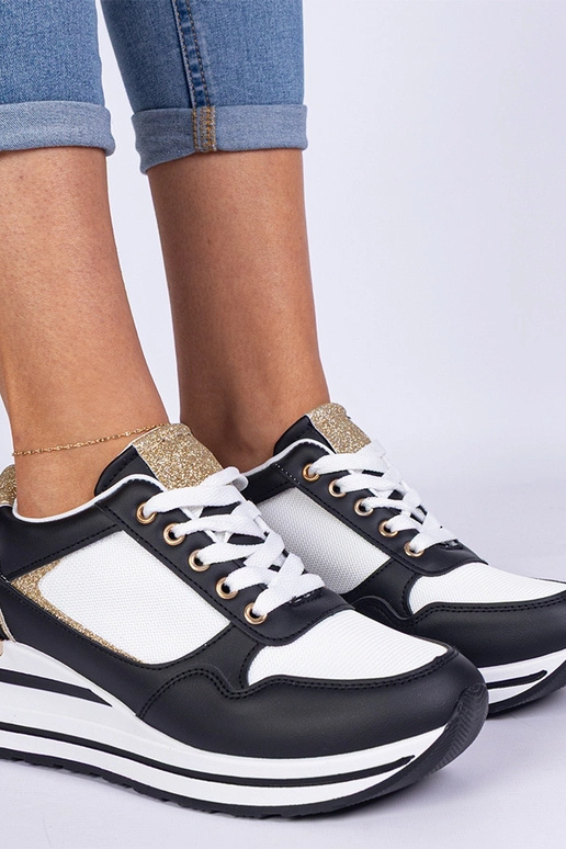 Czarne sneakersy zdobione brokatem i... Czarne sneakersy zdobione brokatem i...