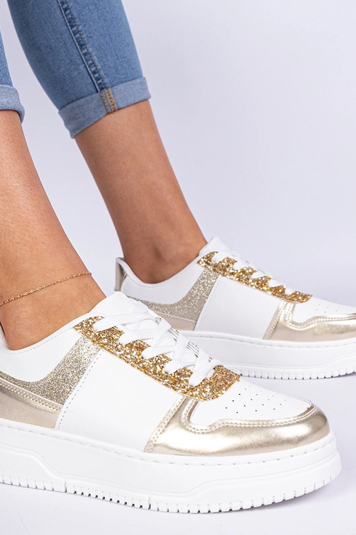 Złote sneakersy damskie na grubej... Złote sneakersy damskie na grubej...