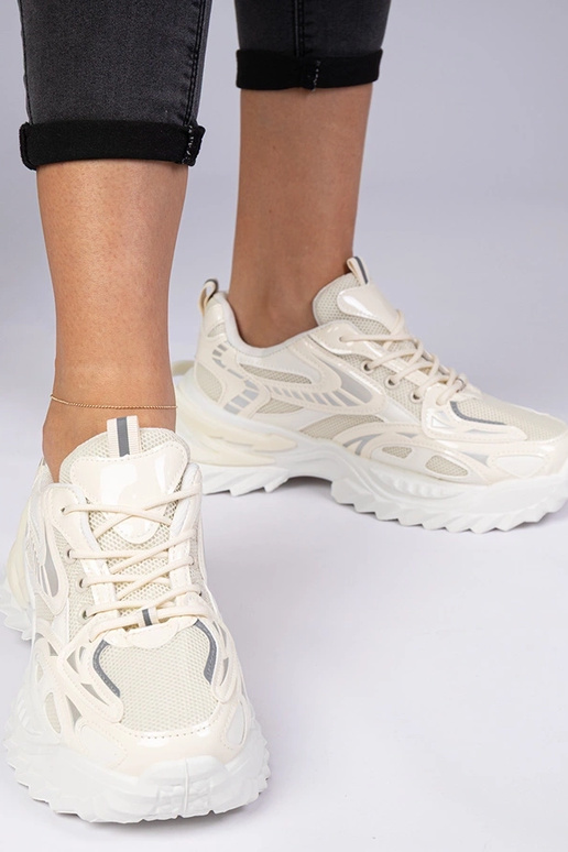 Beżowe sneakersy sportowe na masywnej... Beżowe sneakersy sportowe na masywnej...