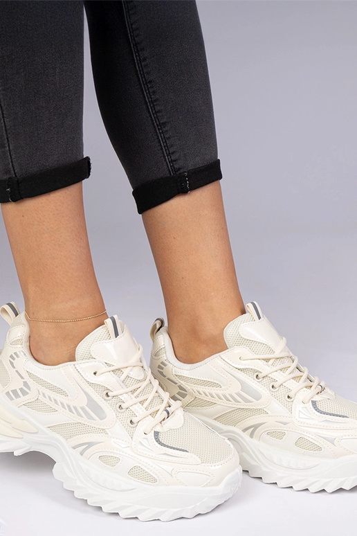 Beżowe sneakersy sportowe na masywnej... Beżowe sneakersy sportowe na masywnej...