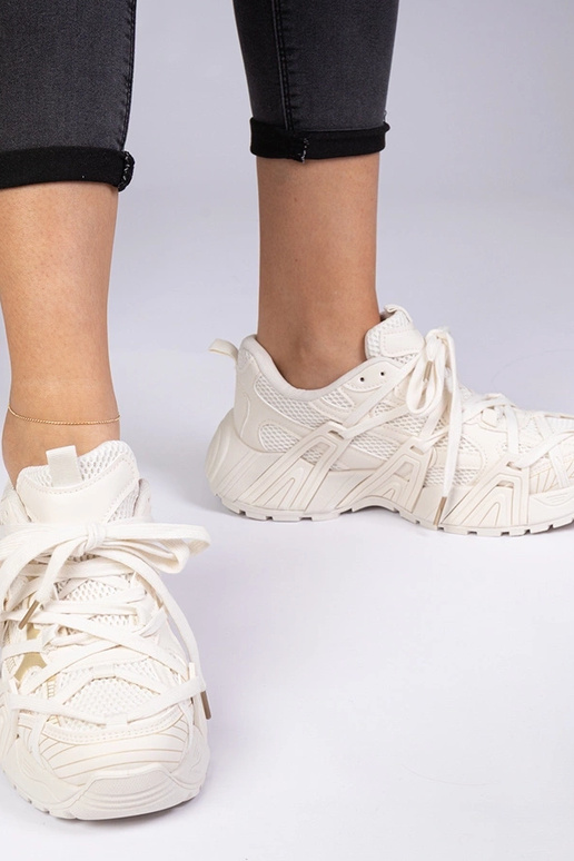 Beżowe sneakersy na masywnej... Beżowe sneakersy na masywnej...