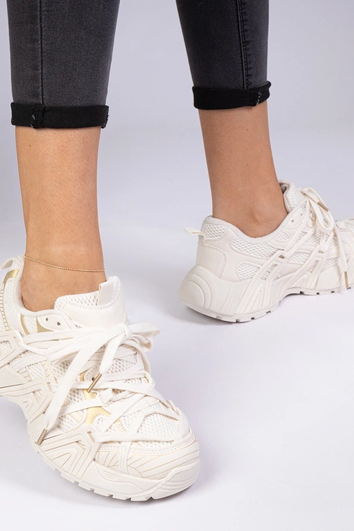 Beżowe sneakersy na masywnej... Beżowe sneakersy na masywnej...