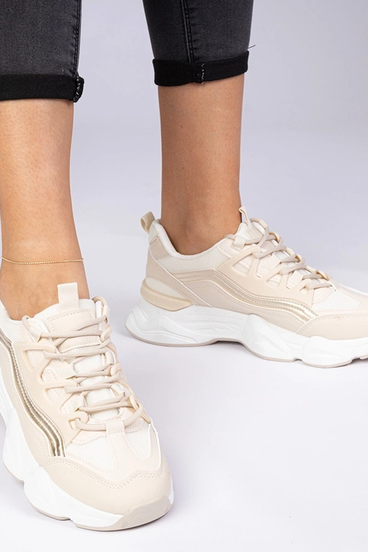 Beżowe damskie sneakersy ze złotym... Beżowe damskie sneakersy ze złotym...