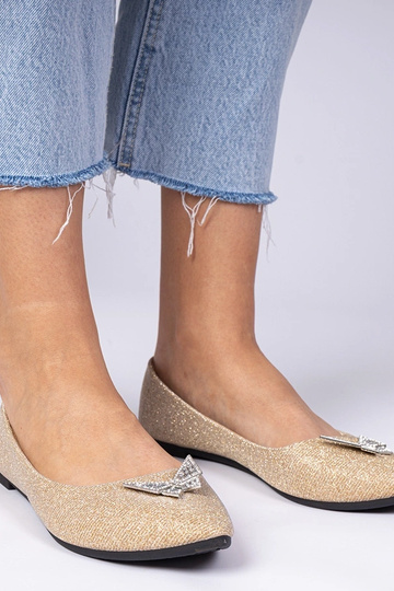 Złote damskie balerinki...