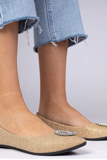 Złote damskie balerinki...