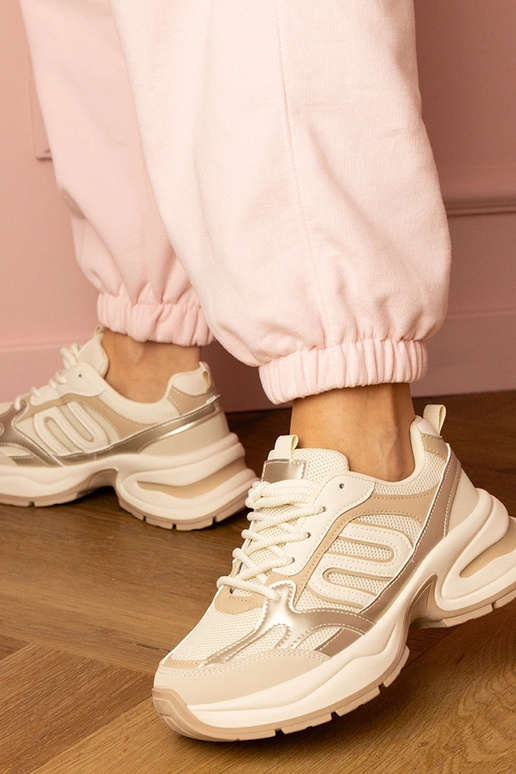 Beżowe sneakersy sportowe na masywnej... Beżowe sneakersy sportowe na masywnej...